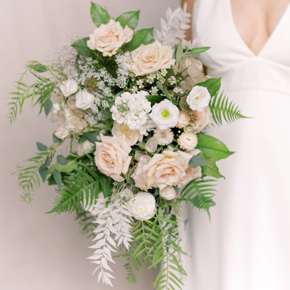 
                  
                    Our Signature Lush Bridal Bouquet
                  
                